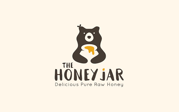 Logo mascotte ours miel